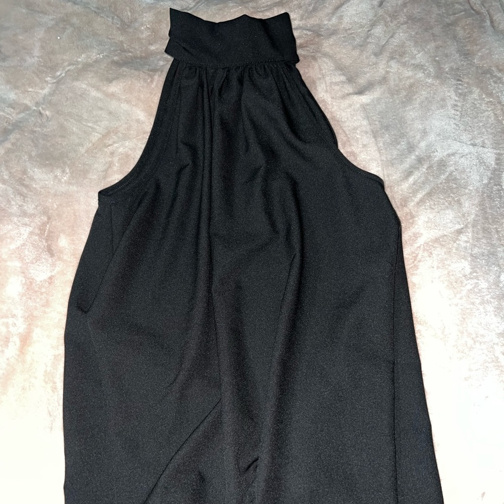 Woman’s black sleeveless Top